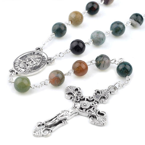St. Charbel Rosary with stone beads and silver cross on a white background
