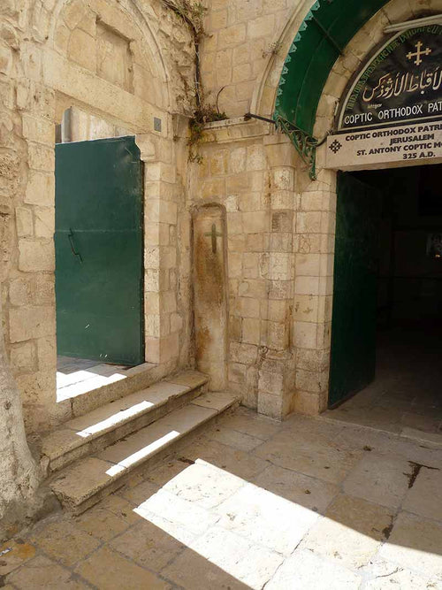 Green doors of the main entrance to the Coptic Orthodox Patriarchate at the Church of Holy Sepulchre.