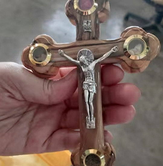A small Olive Wood Budded Crucifix with Four Holy Elements hand-held.