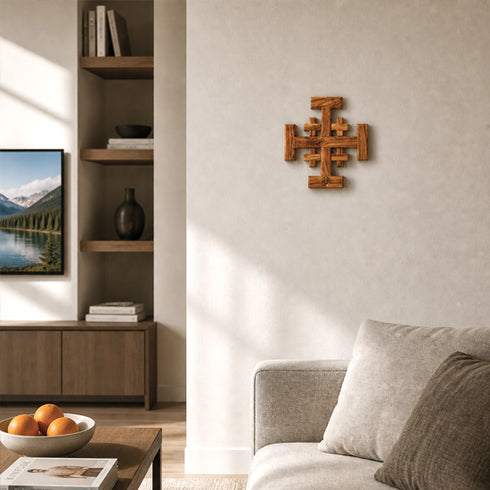 Living room with a wooden cross on the wall, a sofa, and a TV displaying a nature scene.