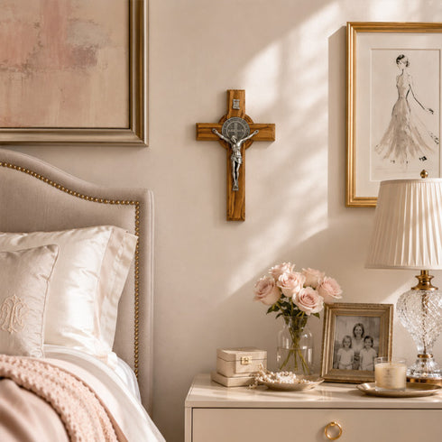 Neatly decorated bedroom with a bed, nightstand, and wall art.