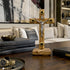 Wooden cross with Jesus corpus on a table in a living room setting
