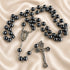 Hematite bead rosary with dark bead strands, oval medal, and crucifix pendant