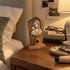 Madonna and Child olive wood plaque displayed in a softly lit bedroom with warm neutral decor