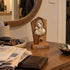 Madonna and Child olive wood plaque displayed in a bright hallway with softly blurred home decor