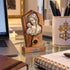 Madonna and Child olive wood plaque displayed in a home office with soft background blur