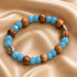 Miraculous Medal Olive Wood Bracelet with Turquoise Crystal