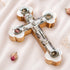 Handmade Eastern cross made of rich olive wood, detailed with white mother of pearl design, silver crucifix, and the four sacred elements from the Holy Land.