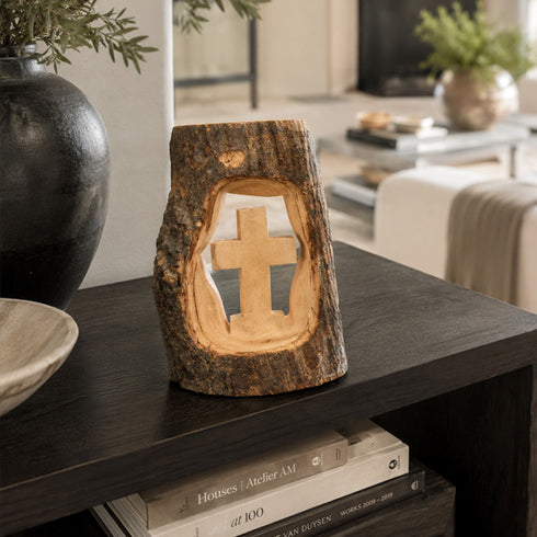 Wood bark with cross design on a table in a living room setting