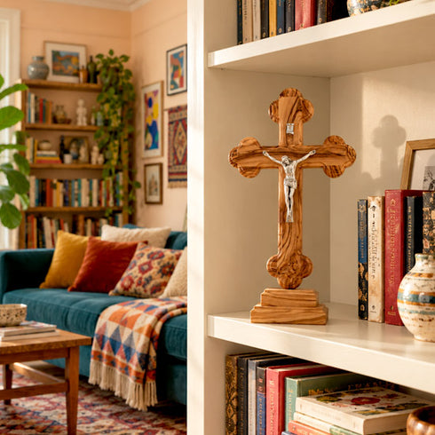 Bethlehem olive wood budded standing crucifix in a family room