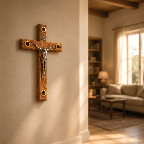 Wooden cross with Jesus Christ figure on a wall in a living room.