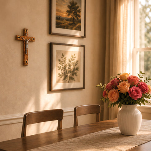 Dining room with wooden table, chairs, and a vase of flowers on a windowsill.