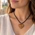 Olive wood heart cross necklace on black cord