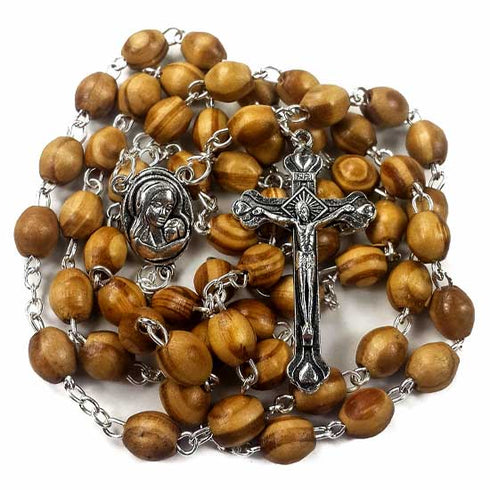 A handmade olive wood rosary with oval beads and iron crucifix, featuring a Mary and baby Jesus iron centrepiece.