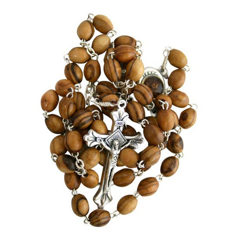 A handmade olive wood rosary with an iron crucifix, featuring a holy soil container centrepiece.