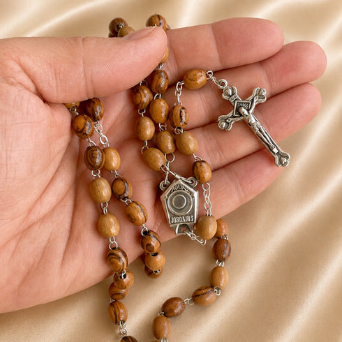 Olive wood rosary with Holy Water centerpiece and INRI crucifix handheld.