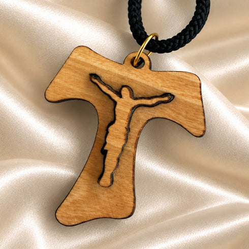 Tau crucifix necklace in olive wood with black braided cord and gold-toned clasp