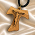 Tau crucifix necklace in olive wood with black braided cord and gold-toned clasp