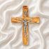 frontal image of a handmade olive wood thorn cross with a crucifix, placed on a white background