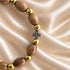 Oval Olive Wood Christian Bracelet with Gold Beads