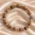 Oval Olive Wood Christian Bracelet with Gold Beads