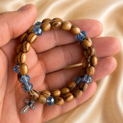 Olive wood wrap bracelet with blue crystal beads and silver cross charms