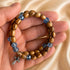 Olive wood wrap bracelet with blue crystal beads and silver cross charms