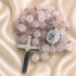 Pink jade bead rosary with cross charms and St. Benedict medal medallion
