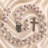 Pink jade bead rosary with St. Benedict medal and silver cross centerpiece
