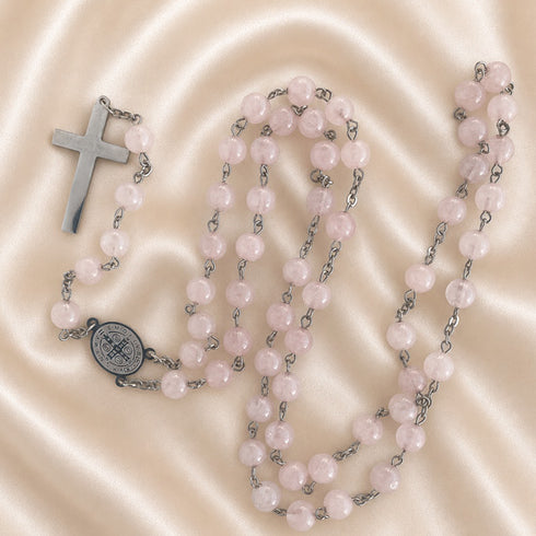 Rosary set with pink jade beads, silver cross, and circular St. Benedict medal