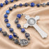 Lapis lazuli rosary with round St. Benedict medal and silver crucifix close-up