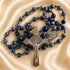 Lapis lazuli rosary featuring silver crucifix with St. Benedict medal and INRI detail