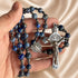 Lapis lazuli bead rosary with silver St. Benedict medallion and crucifix centerpiece