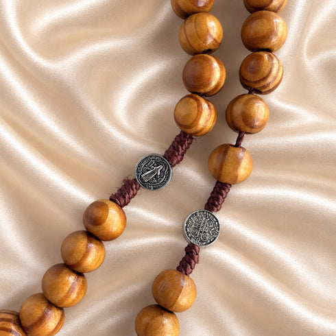 Detailed olive wood rosary with Saint Benedict and Miraculous Medal elements