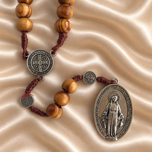 Olive wood Catholic rosary with Saint Benedict and Miraculous Medal devotional details