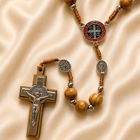 Olive wood prayer beads with St. Benedict medal centerpiece and silver crucifix.