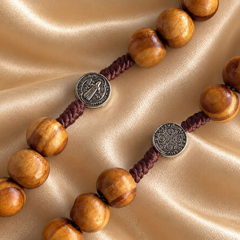 Olive wood Saint Benedict rosary with Crown of Thorns crucifix from an alternate angle