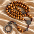 Close view of Saint Benedict olive wood rosary beads and Crown of Thorns crucifix