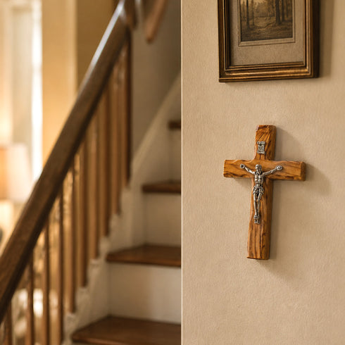 Small thorn crucifix on a wall near staircase