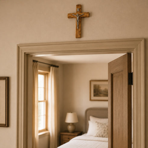 Small thorn crucufix on a wall above a door