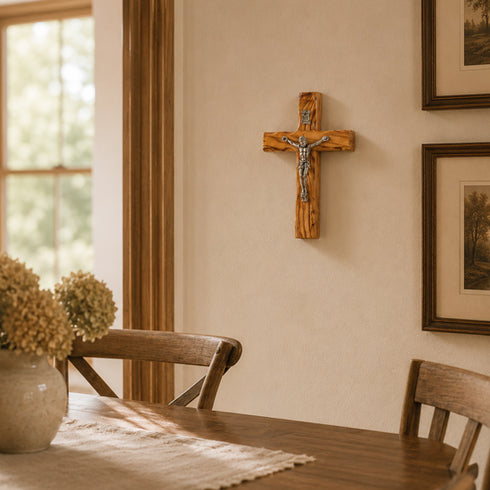 Small thorn cross on a wall near a winbdow