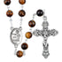 Rosary with brown beads and silver cross on a white background