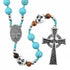 Turquoise beaded rosary with silver and wooden elements on a white background