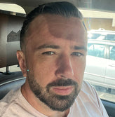 Middle aged guy in a car