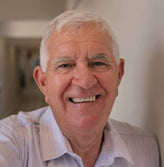 Smiling elderly guy with white hair