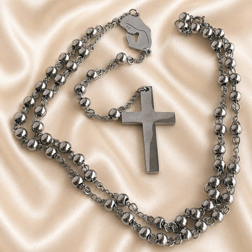 Stainless steel rosary featuring Virgin Mary centerpiece and long beaded chain with cross