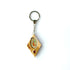 Olive wood keychain featuring a printed image of the Virgin Mary and a capsule of Holy Soil from the Holy Land, set against a white background.