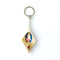 An olive wood keychain with a metal ring, featuring a painted image of the Jesus Christ Sacred Heart with Holy Soil on a white background.