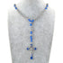 Saint Benedict stainless steel crucifix rosary with blue cording and silver beads on white background.
