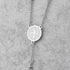 Compact 4mm stainless bead rosary with silver Saint Benedict cross and medal.